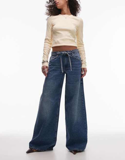 Vaqueros azules de pernera ancha con lazada en la cintura Olivia de Mango