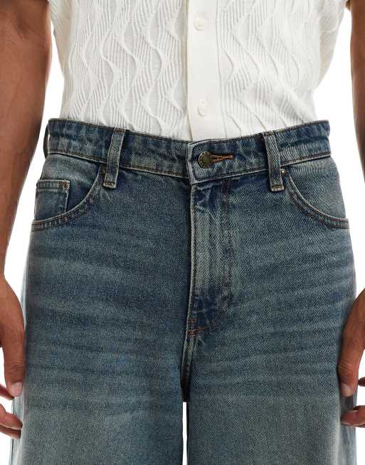 Vaqueros azules de pernera muy ancha con lavado oscuro de ASOS DESIGN, 4 de 5