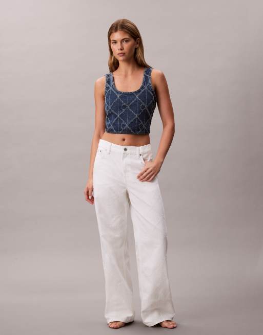 Vaqueros color crudo holgados de talle bajo con diseño a láser de logo repetido de Calvin Klein Jeans