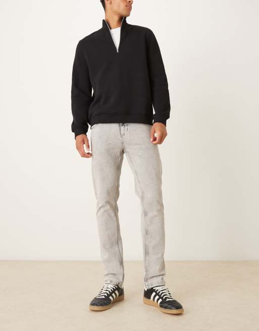 Vaqueros cómodos elásticos con lavado claro de corte slim de ASOS DESIGN