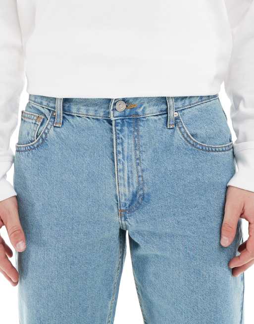 Vaqueros con lavado azul claro tintado de corte tapered de ASOS DESIGN , 5 de 5