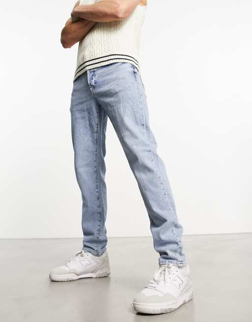 Vaqueros con lavado claro de corte tapered slim de Selected Homme 
