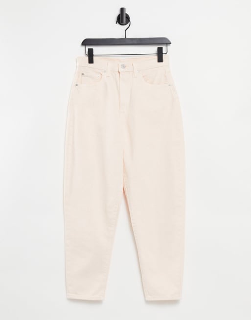 Vaqueros crudos de corte tapered y talle alto de Levi's