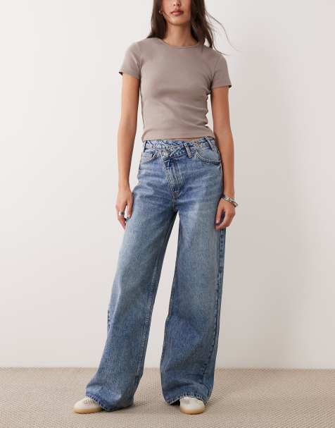 Vaqueros dad de pernera ancha con cintura cruzada y lavado medio de ASOS DESIGN - view 1