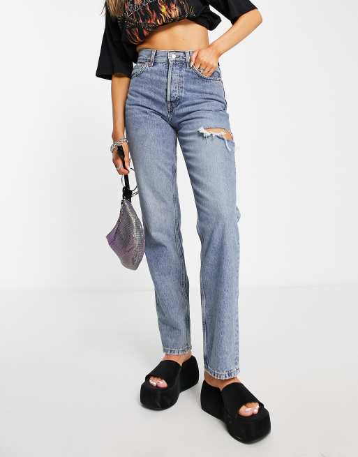 Vaqueros dad descoloridos con detalle rasgado en el lateral de Topshop