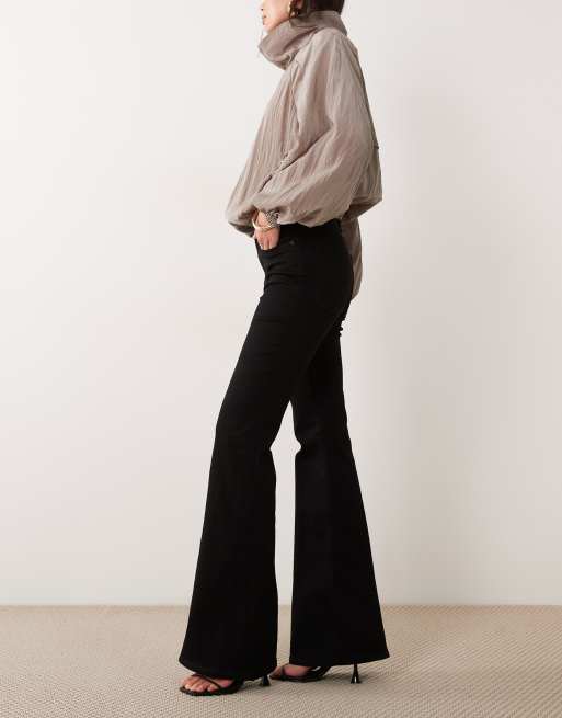 Vaqueros de campana negros Good Legs de Good American, 3 de 5