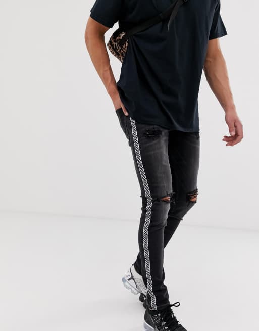 Vaqueros de corte ajustado con rayas con diseño de tablero de ajedrez en los laterales de Jack & Jones Intelligence
