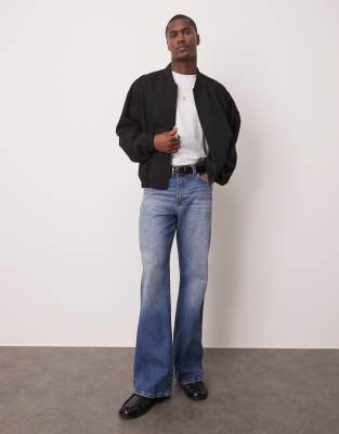 Vaqueros de corte ancho acampanado con lavado azul claro de ASOS DESIGN - view 1