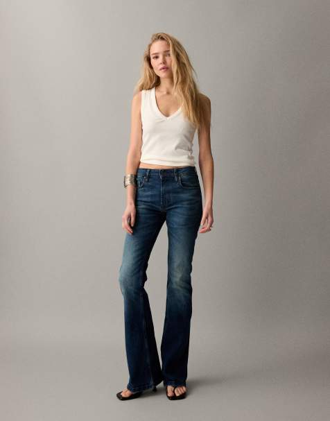 Vaqueros de corte bootcut acampanado con lavado medio oscuro de ASOS DESIGN - view 1