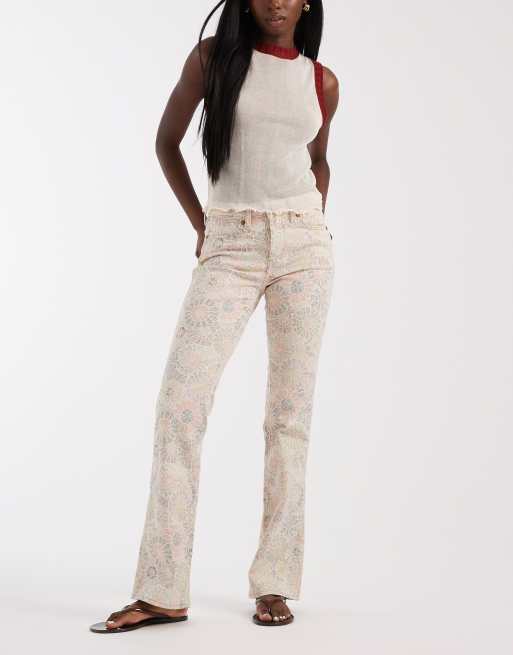 Vaqueros de corte bootcut con estampado floral de Wrangler