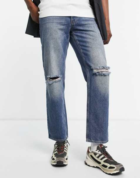 Vaqueros de corte estándar con lavado medio teñido y diseño rasgado de ASOS DESIGN - view 1