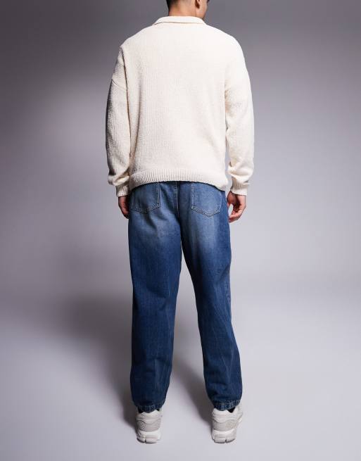 Vaqueros de corte globo con lavado azul oscuro y tintado envejecido de ASOS DESIGN, 2 de 5