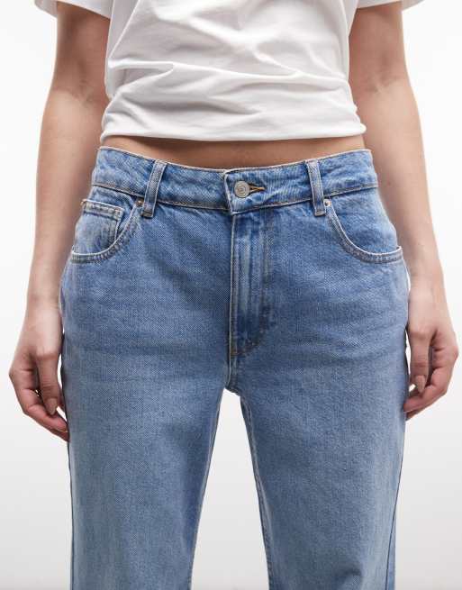 Vaqueros de corte holgado acampanado con lavado medio claro de ASOS DESIGN, 4 de 5