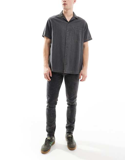Vaqueros de corte pitillo con lavado negro de ASOS DESIGN