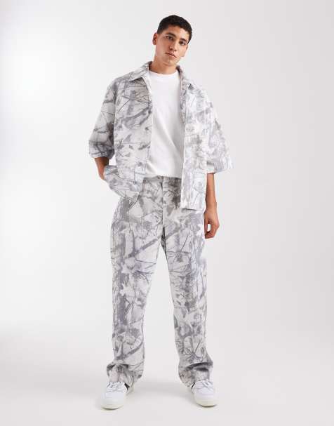 Vaqueros de corte recto suelto con estampado de camuflaje de ASOS DESIGN (parte de un conjunto) - view 1