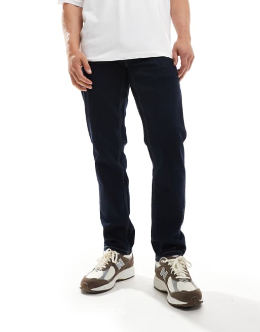 Vaqueros de corte slim con acabado aclarado oscuro Elm de Farah 