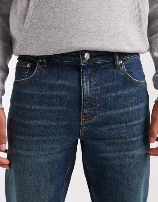 Vaqueros de corte slim con lavado azul oscuro de ASOS DESIGN, 4 de 5