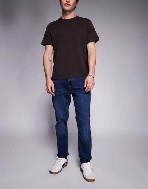 Vaqueros de corte slim con lavado en azul oscuro de River Island - view 1