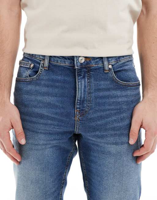 Vaqueros de corte slim elástico con lavado oscuro de ASOS DESIGN, 5 de 5