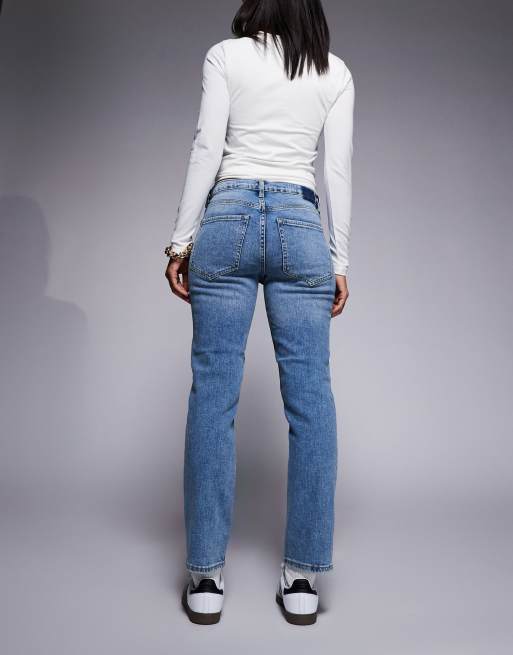 Vaqueros de corte slim y talle alto con lavado medio de River Island, 3 de 5