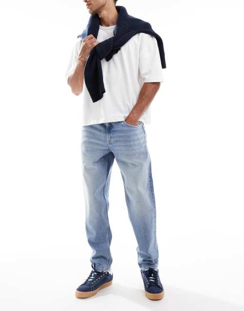 Vaqueros de corte tapered con lavado azul claro de ASOS DESIGN - view 1
