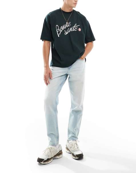 Vaqueros de corte tapered con lavado azul claro de ASOS DESIGN - view 1