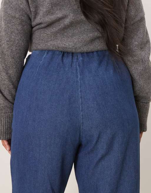 Vaqueros de pernera ancha con acabado enjuagado y parte delantera lisa de tejido suave de ASOS DESIGN Curve, 4 de 5