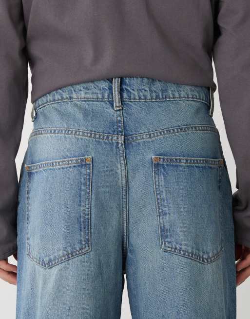 COLLUSION X003 wide leg jeans in midwash blue