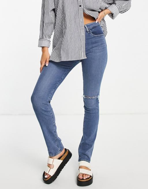 Vaqueros de talle alto y corte recto con lavado azul medio de Levi's 724 