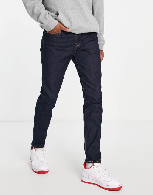 Vaqueros de talle bajo y corte tapered slim con lavado azul oscuro 512 de Levi's