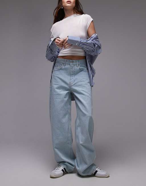 Vaqueros descoloridos de tiro bajo y estilo skater de Topshop