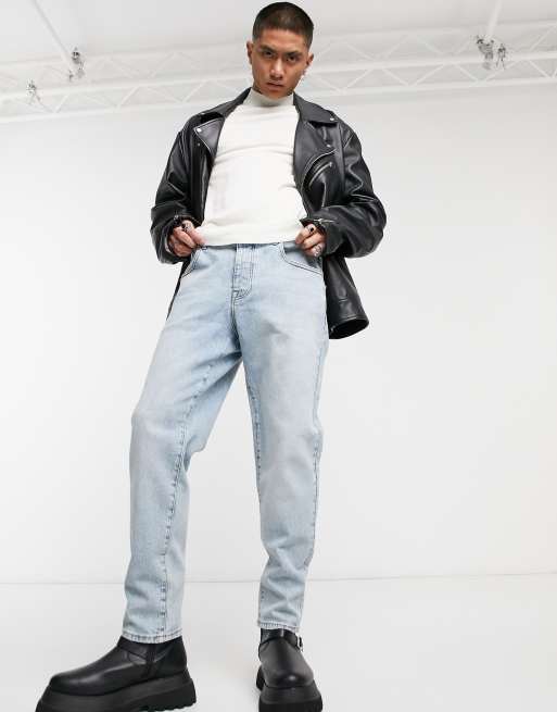 Vaqueros elásticos con lavado claro vintage de ASOS DESIGN