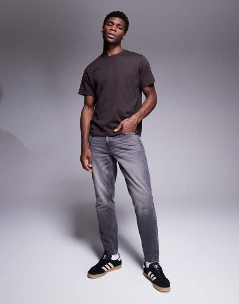 Vaqueros gris lavado de corte tapered de ASOS DESIGN - view 1