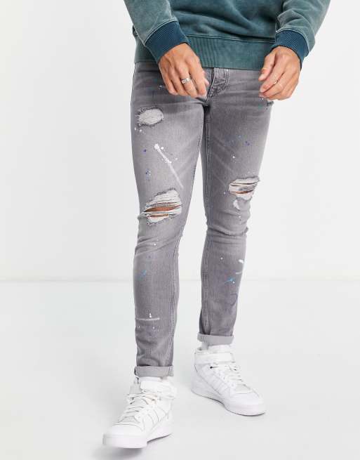 Vaqueros grises elásticos de corte pitillo con estampado de salpicaduras de pintura y diseño rasgado y remendado de Topman