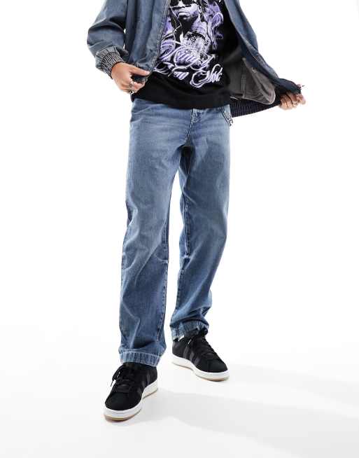 Vaqueros holgados con lavado azul medio de ASOS DESIGN