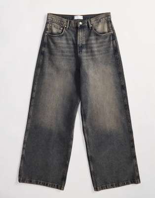 Vaqueros holgados con lavado medio y bajos anchos de ASOS DESIGN - view 1