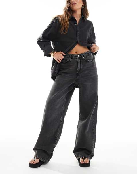 Vaqueros holgados con lavado negro claro de Miss Selfridge - view 1