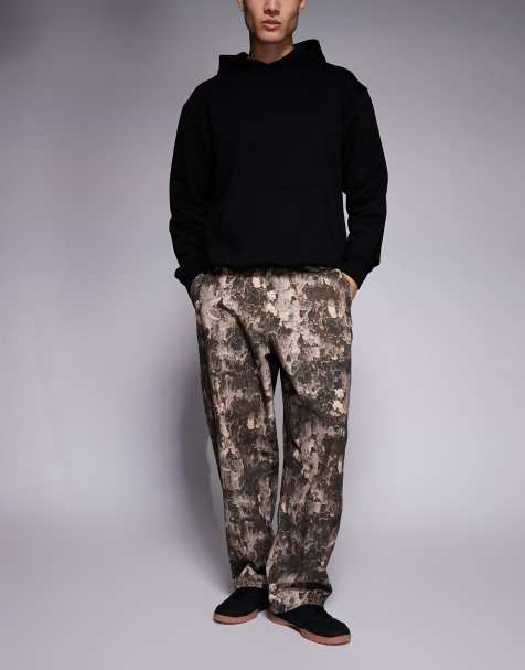 Vaqueros marrones de corte recto suelto con estampado de camuflaje de ASOS DESIGN - view 1