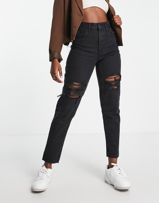 Vaqueros mom negros desgastados de talle alto de Levi's , 3 de 4