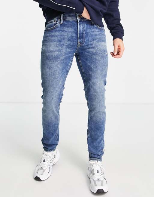 Vaqueros muy elásticos de corte pitillo con lavado azul medio de Jack & Jones Intelligence