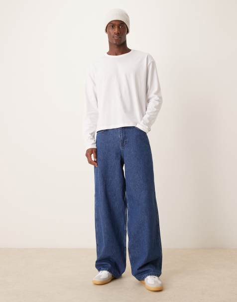 Vaqueros muy holgados con lavado azul medio y parte trasera elástica de ASOS DESIGN - view 1