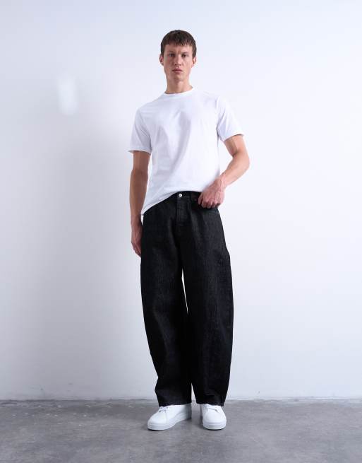 Vaqueros negro crudo rígidos de corte barrel de Topman, 2 de 7