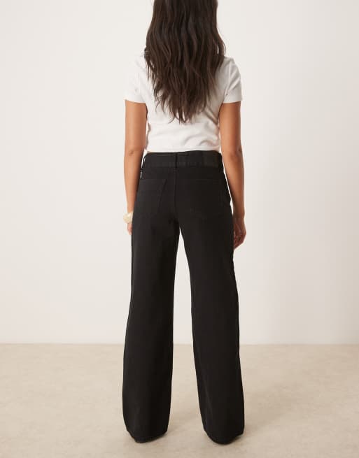 Vaqueros negro enjuagado de talle medio y pernera ancha Rena de AWARE , 3 de 5