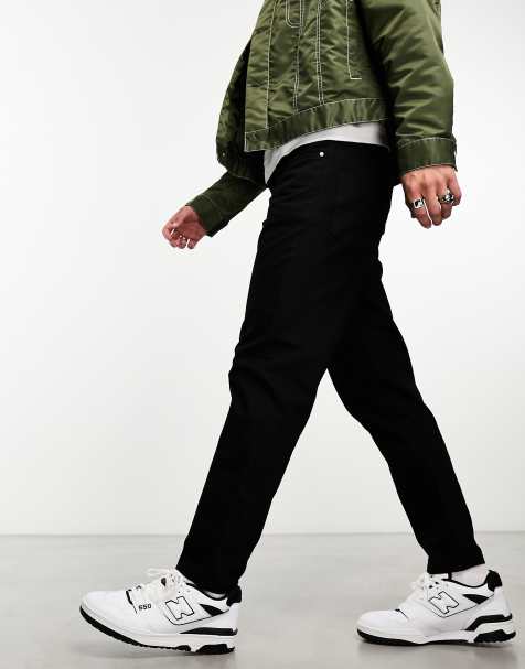 Vaqueros negro impoluto de corte tapered de ASOS DESIGN - view 1