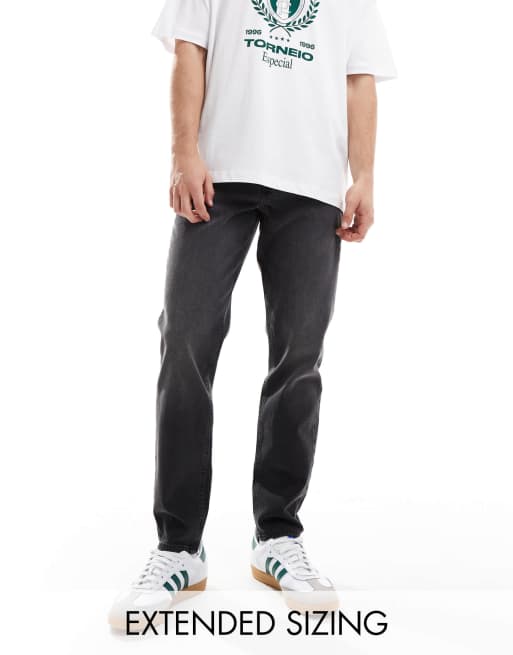 Vaqueros negro lavado de corte tapered con acabado tintado de ASOS DESIGN