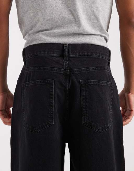 Vaqueros negro lavado de pernera ancha con pinzas de ASOS DESIGN, 4 de 5
