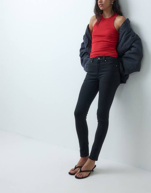 Vaqueros negro limpio de corte pitillo de ASOS DESIGN, 4 de 5