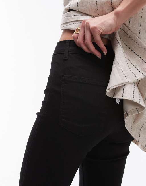 Vaqueros negro puro de corte superpitillo y talle alto Joni de Topshop, 3 de 5