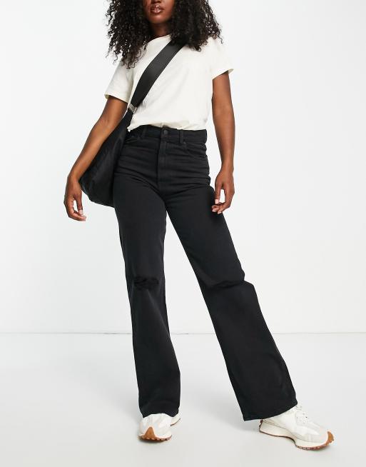 Vaqueros negro vintage de talle alto y pernera ancha con diseño desgastado de Waven