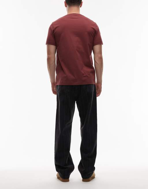 Vaqueros negros a rayas de corte tapered suelto Rylan de Carhartt WIP, 2 de 5